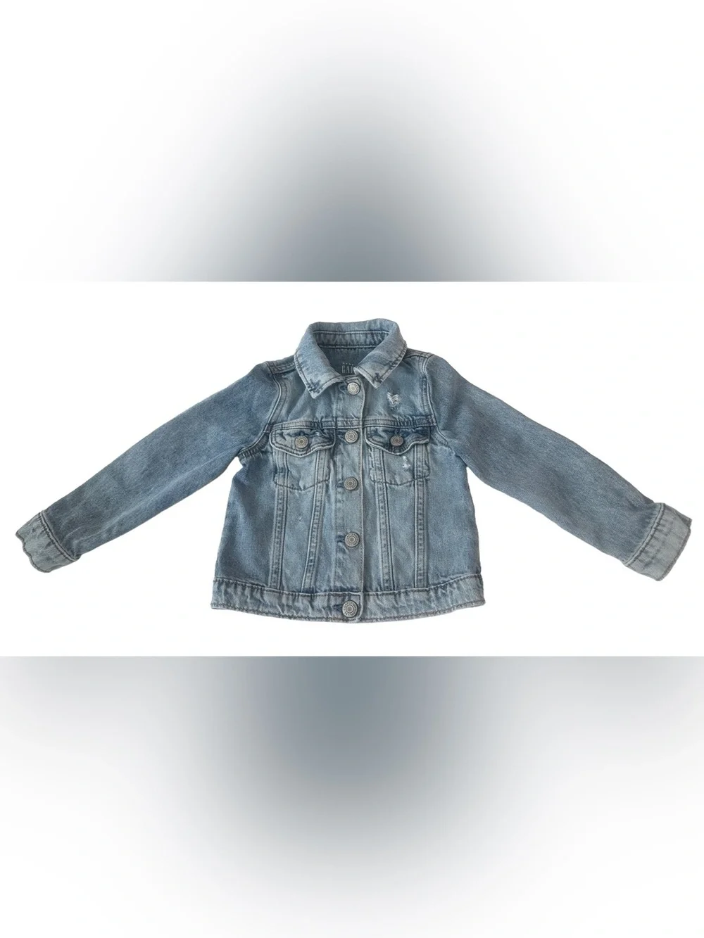 Gap girl’s Icon Denim Jacket. with distressed detailing at the chest.  Size 4T.